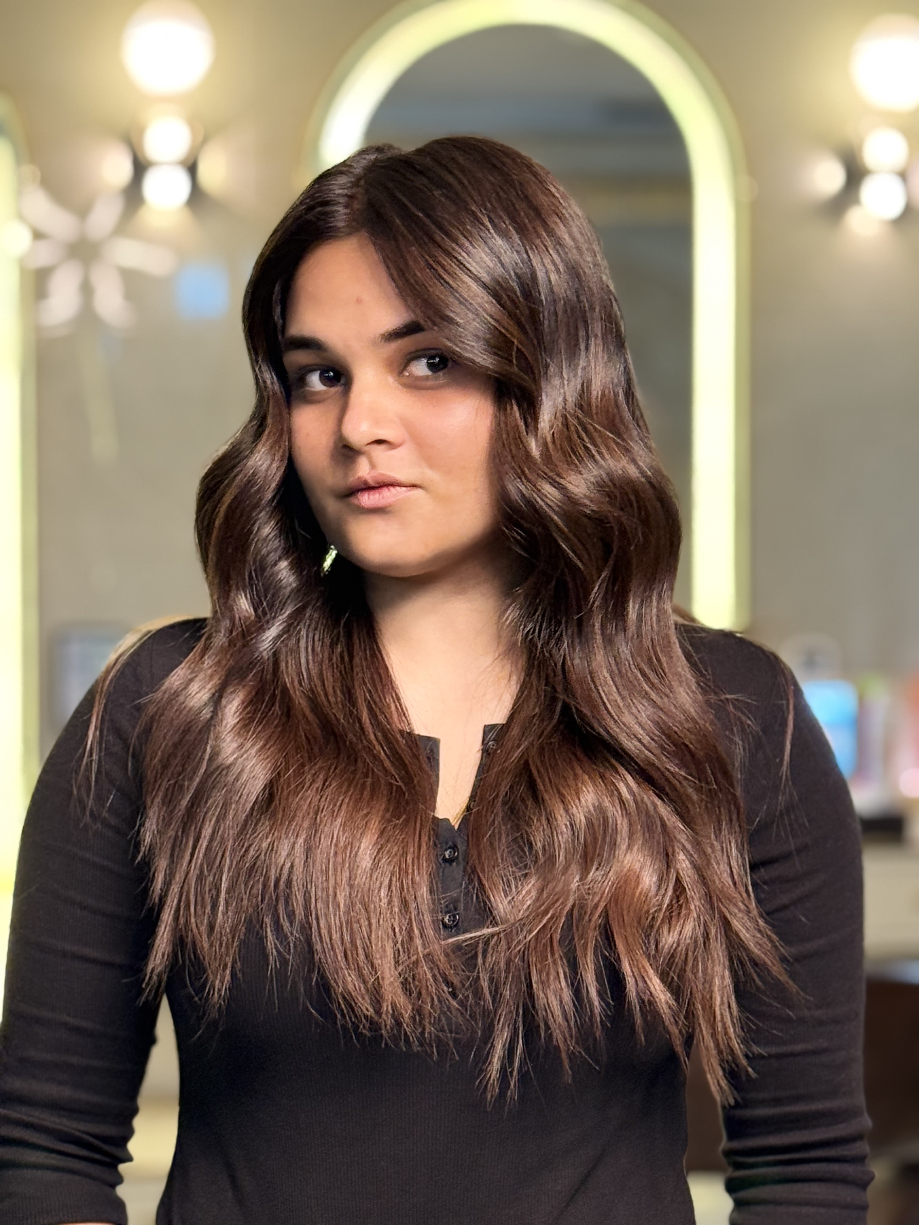 Professional mocha brown hair color transformation by Brij Hair Artistry - expert hair coloring technique showcasing depth and dimension